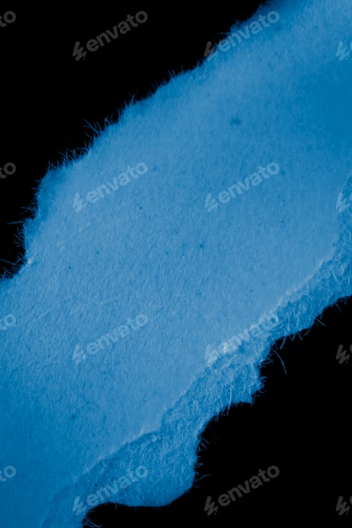 Preview: blue piece of paper on black isolated background