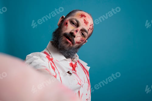Preview: Halloween monster taking picture on camera