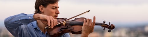 Preview: Linkedin banner with an inspired musician playing the violin