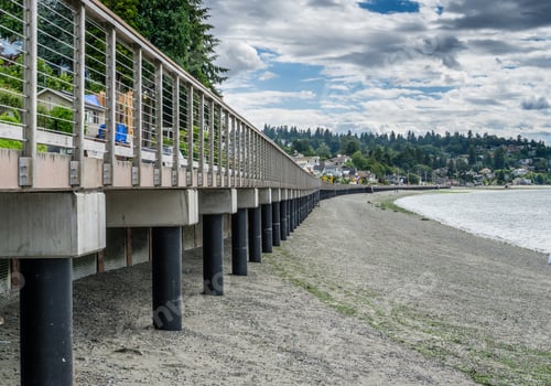Preview: A View From Beneath The Boardwalk At Redondo Beach, Washington. The Tide Is Low.