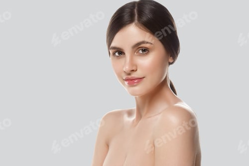 Preview: Beautiful woman face close up studio on gray background