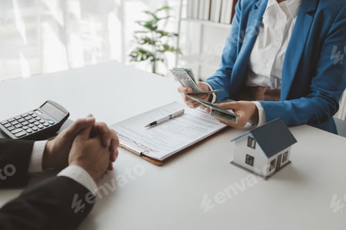 Preview: Business Meeting with Money and Contract Agreement