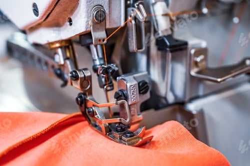 Preview: Professional sewing machine close-up. Modern textile industry.