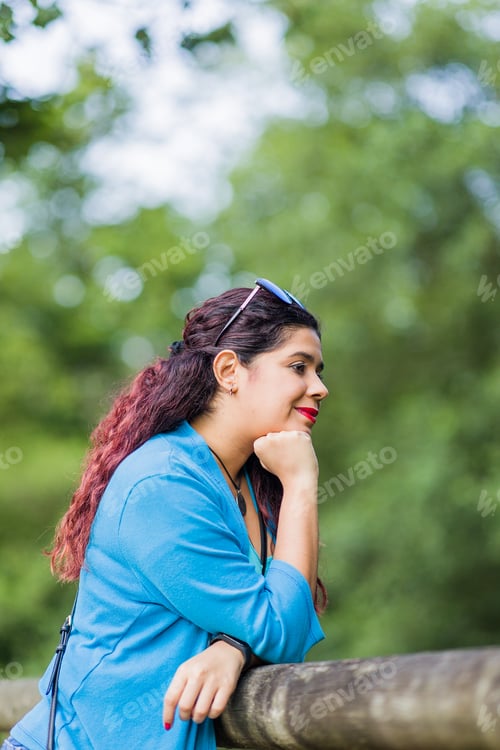 Preview: thinking outside in nature wellness self care relaxation. south american woman in senda del oso