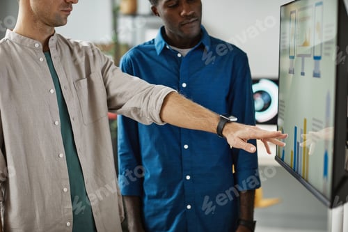Preview: People Using Digital Screen in Office