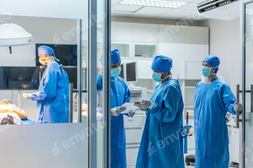 Preview: Surgical Team in Operating Room Prepares for Surgery