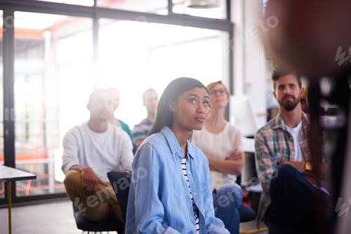 Preview: They each have their own ideas. Cropped shot of young designers working together in their office.