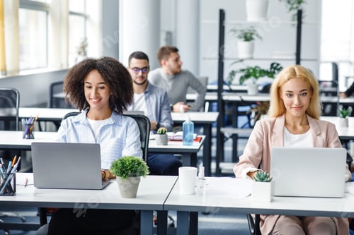 Preview: Work in modern office, digital technology and social distancing after quarantine. European and