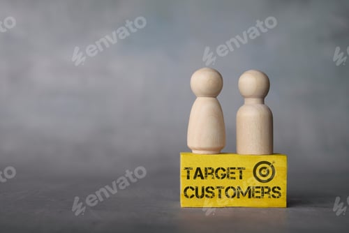 Preview: Wooden dolls with text TARGET CUSTOMERS.