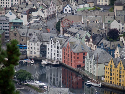 Preview: Is a scenic view of a picturesque Alesund in Norway with a body of water in the foreground