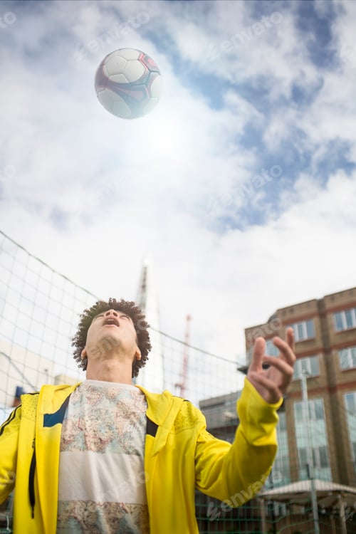 Preview: Young man practising football skills