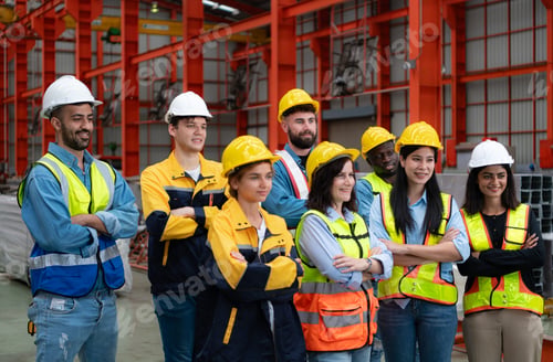 Preview: Portrait of engineers and industrial workers in hardhats at construction site