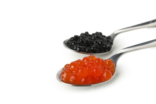 Preview: Spoons with black and red caviar isolated on white background