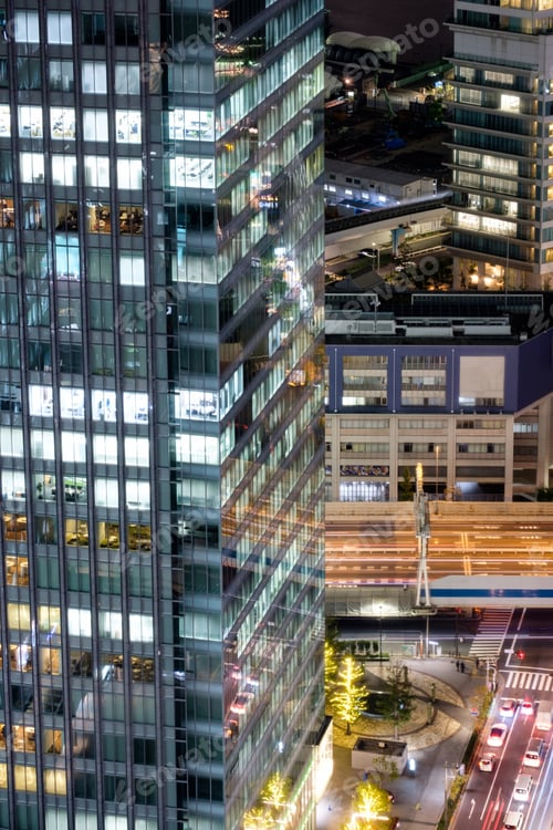 Preview: Modern building skyscraper glass window with illuminated and traffic