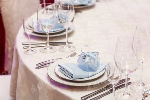 Preview: luxury wedding arrangement of stylish glasses plates on napkins and silver cutlery