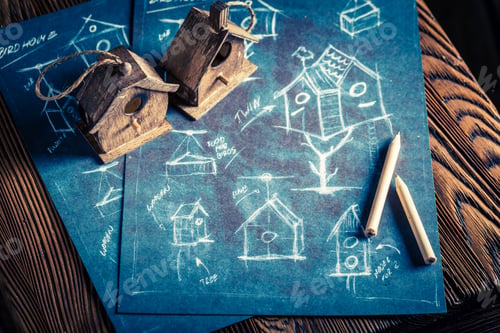 Preview: Closeup of project of small bird house in wooden workshop