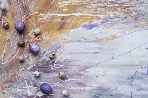 Preview: Painted chicken and quail eggs on stained background