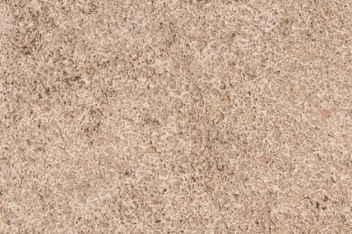 Preview: Beautiful background of beige color building material, bulk mixture for urban road surface
