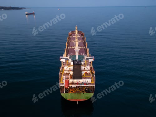 Preview: Large bulk carrier cargo ship Floating on Vast Water