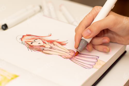 Preview: Girl's hand drawing anime manga sketch with alcohol based sketch markers.