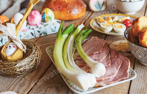 Preview: Easter holiday food on rustic wooden table.