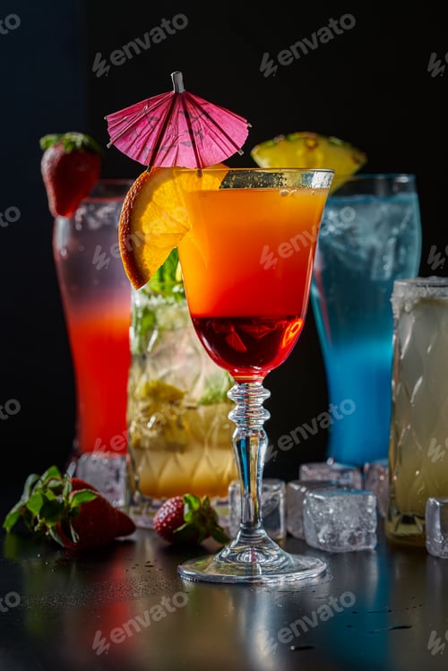 Preview: a group of various drinking glasses without alcohol On a black background