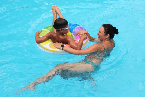 Preview: A mother's gentle push; a child's carefree ride. Illustrates the balance of nurturing and