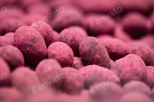 Preview: Candies in the shape of eggs, sweets background.