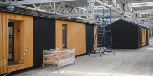 Preview: A new wooden modular prefabricated house inside in manufacturing facility