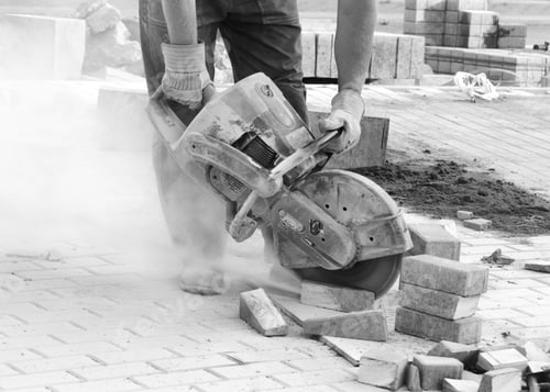 Preview: Construction worker with concrete saw working