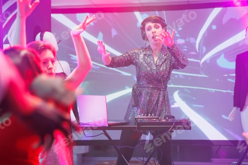 Preview: Woman mixing sound with dj station