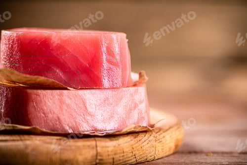 Preview: Fresh raw tuna steak on the table.