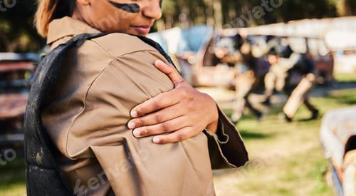 Preview: Hands, soldier and arm injury in paintball sport, running or military training from intense battle