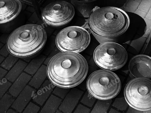 Preview: Greyscale shot of handmade kitchen utensils on the ground in Alacati, Izmir, Turkey