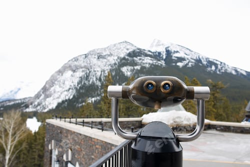 Preview: Coin operated binoculars by snow covered mountain, Banff, Canada