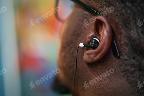 Preview: Listening to Music with Earphones Close-Up