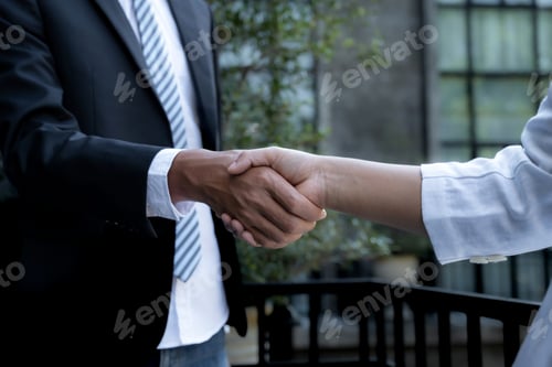 Preview: Handshake after Business management group meeting to plan strategies to increase business income