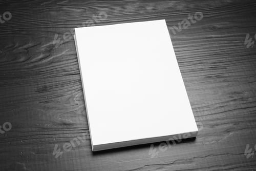 Preview: Stack of blank paper sheets for brochure on black wooden background. Mock up