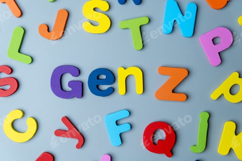 Preview: The phrase GEN Z is spelled out in colorful wooden letters scattered on a gray background.