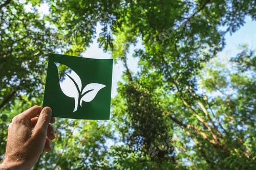 Preview: Hand holding eco friendly green living symbol