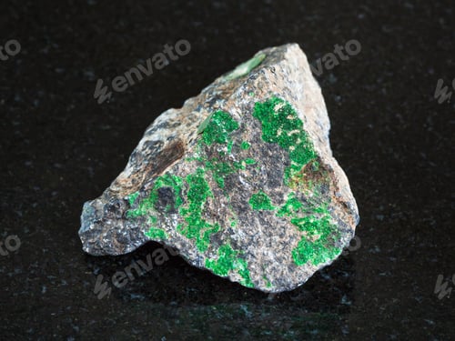 Preview: Uvarovite on rough Chromite stone on black