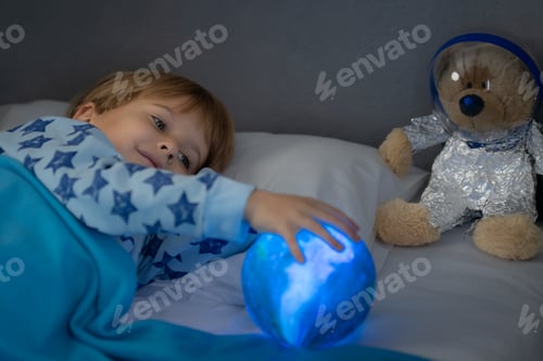 Preview: Happy child sleeping at home