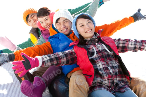 Preview: Happy young people having fun in ski resort