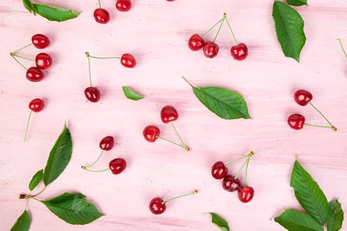 Preview: Ripe cherry berries and cherry leaf