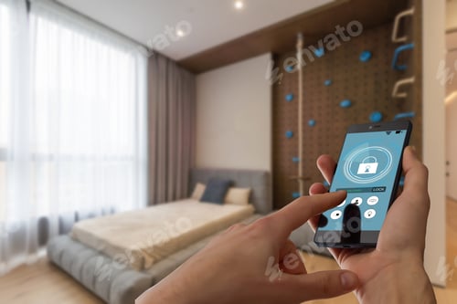 Preview: Smart home automation app on smartphone hold by female hand with home interior in background