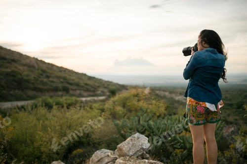 Preview: Female tourist photographing landscape, Mineral de Pozos, Guanajuato, Mexico