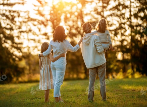 Preview: Happy family at sunset