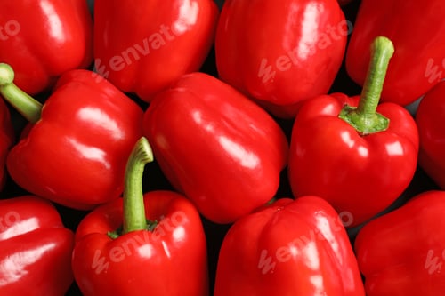 Preview: Many ripe red bell peppers as background, top view