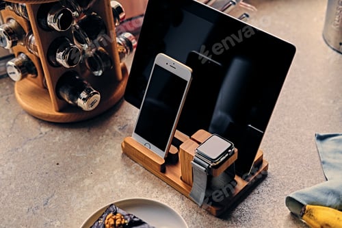 Preview: Bamboo wooden stand with smart watch, tablet and smart phone.
