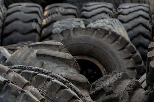 Preview: Closeup used truck tires. Old tyres waste for recycle or for landfill. Black rubber tire of truck.